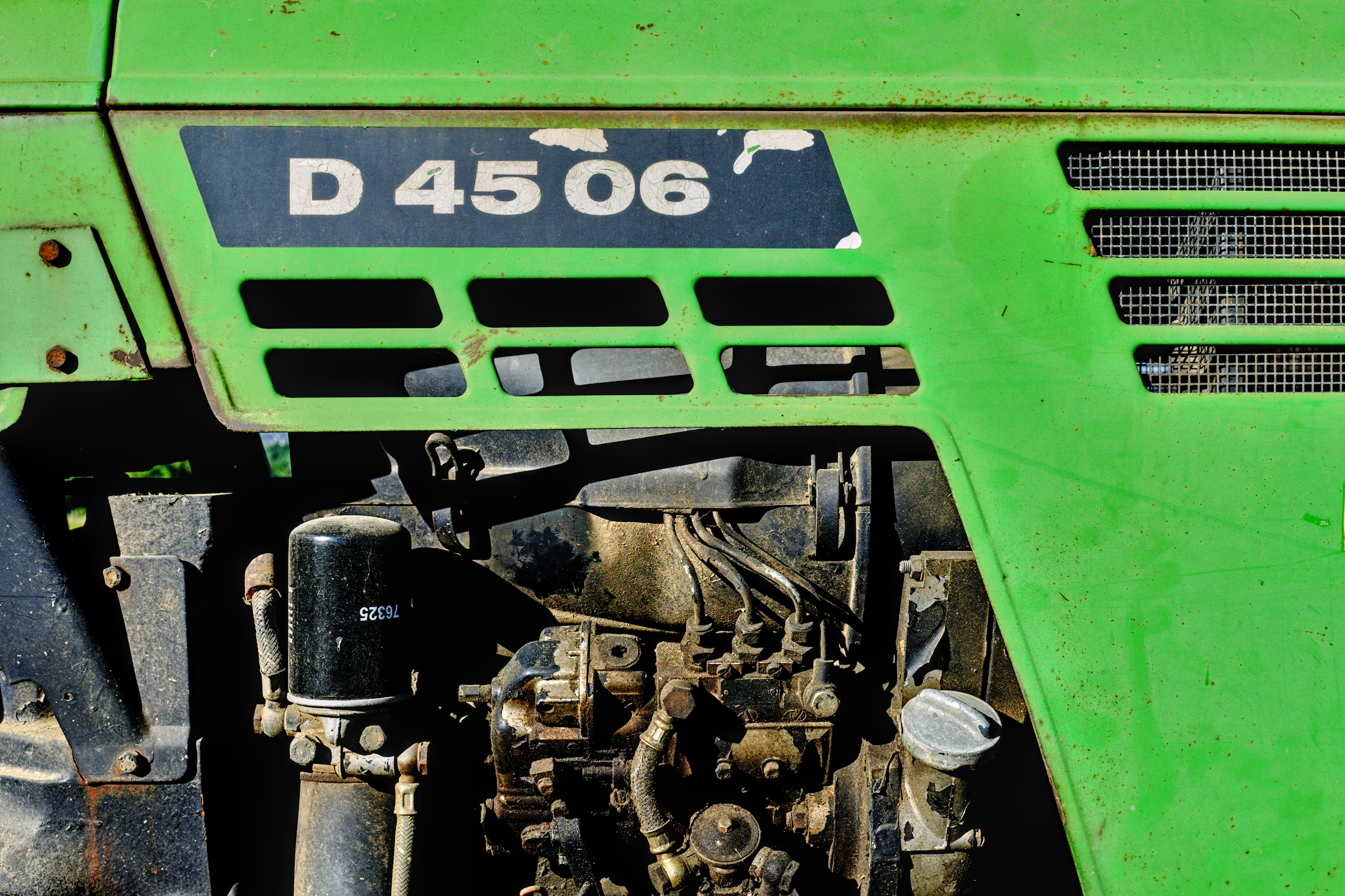 Closeup of part of a tractor.